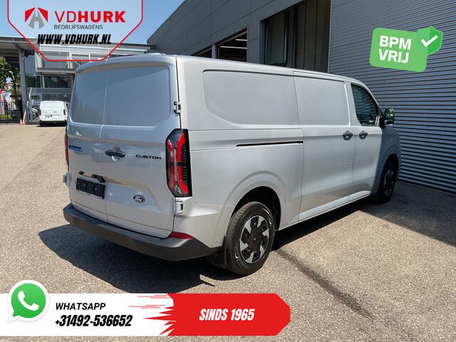 Ford TRANSIT CUSTOM E-Transit L2 65 kWh 330 km WLTP Garantie t/m 05-'29/ LED/ Snellader/ Standkachel/ Stoelverw./ Stuurverw./ Carplay/ Camera/ PDC/ Climate/ Cruise