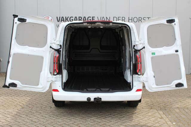Ford TRANSIT CUSTOM E-Transit ELEKTRISCH 320 L2H1 Limited 65 kWh 218 pk Meerprijs 17" lichtmetalen wielen ¤. 1.500,- Autm. airco, stoel-, spiegel- en voorraamverw., camera, trekhaak, cruise cntrl, navigatie by Apple Carplay/ Android auto, telefoonvoorb., LED verl. etc.