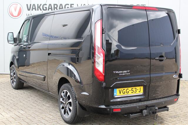 Ford TRANSIT CUSTOM 300 2.0-170pk TDCI L2H1 Limited AUTOMAAT ! Luxe bedrijfswagen die u nog jaren van dienst kan zijn. Airco, camera, stoel- en voorraamverw., schuifd. li+re., cruise cntrl, 17" LM wln, trekhaak, 3-zits,, navigatie, telefoonvoorb. etc.