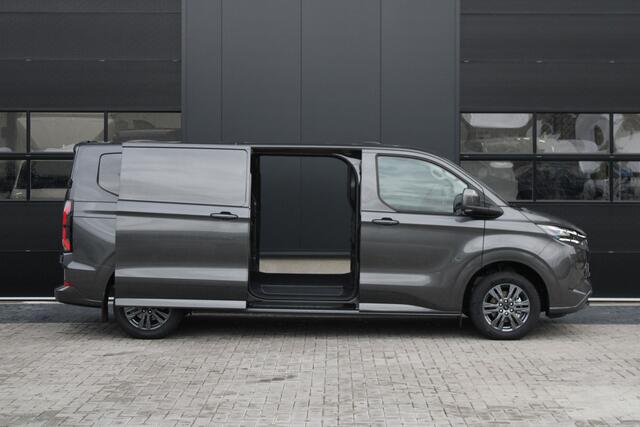 Ford TRANSIT CUSTOM E-Transit 340 L2H1 Limited 71 kWh 218pk - 2x Schuifdeur - LED - 360 Camera - B&O - ACC - Navi - Stoel/Stuurverwarming - Rijklaar