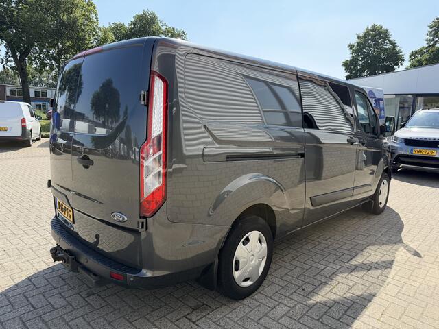 Ford TRANSIT CUSTOM 320 2.0 TDCI automaat L2H1 Trend / 3 persoons / vaste prijs rijklaar ¤ 17.950 ex btw / lease vanaf ¤ 302 / trekhaak / laadruimte gestoffeerd / airco / cruise / magneic grey metallic