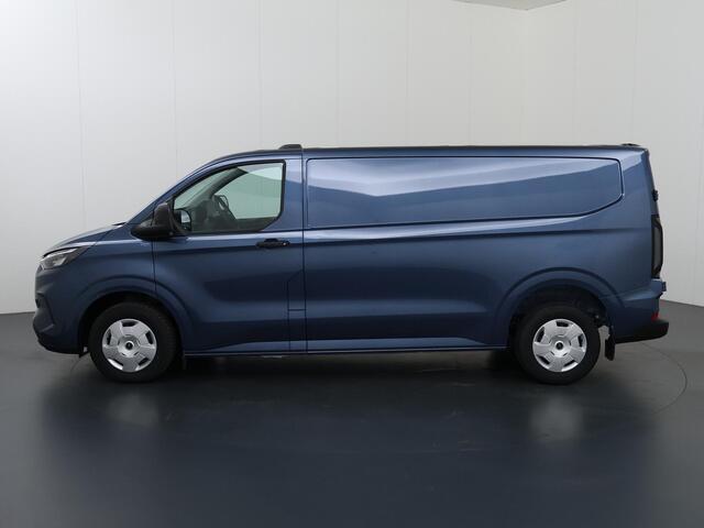 Ford TRANSIT CUSTOM 320 | 2.0 TDCI | L2 H1 | TREND | PARKEERCAMERA | APPLE CARPLAY | ANDROID AUTO | 3-ZITS | CLIMATE CONTROL | VOORRUITVERWARMING | CRUISE CONTROL | METALLIC LAK CHROME BLUE