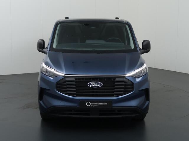 Ford TRANSIT CUSTOM 320 | 2.0 TDCI | L2 H1 | TREND | PARKEERCAMERA | APPLE CARPLAY | ANDROID AUTO | 3-ZITS | CLIMATE CONTROL | VOORRUITVERWARMING | CRUISE CONTROL | METALLIC LAK CHROME BLUE