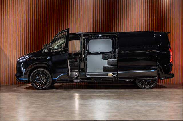 Ford TRANSIT CUSTOM E-Transit 340 L2H1 Sport 71 kWh | 350 KM Range | 360 Camera | Driving Assistant | L+R Schuifdeuren | DSS LED | Stoel/Stoel | Middenconsole | Navigatie | CarPlay | ACC | Blind Spot | Stuur- en stoelverwarming | Trekhaak | Dakdragers | E-Transit Custom | Ze