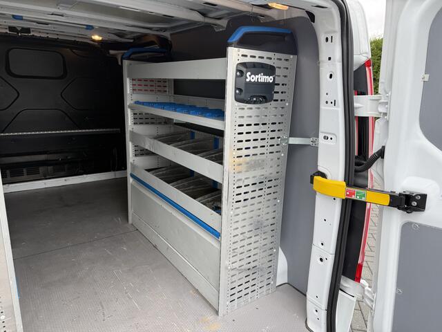 Ford TRANSIT CUSTOM 2.0 TDCI / L2H1 / 1e EIG. / SORTIMO INRICHTING / TREKHAAK / CRUISE / 3-ZITS / 2800 KG AHG
