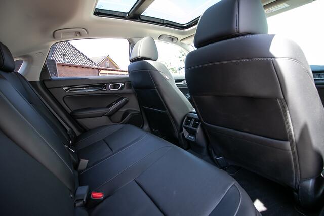 Honda CIVIC 2.0 e:HEV Advance - Afn. trekhaak | Schuif/-kanteldak | All-seasonbanden | Stoel+stuurverwarming