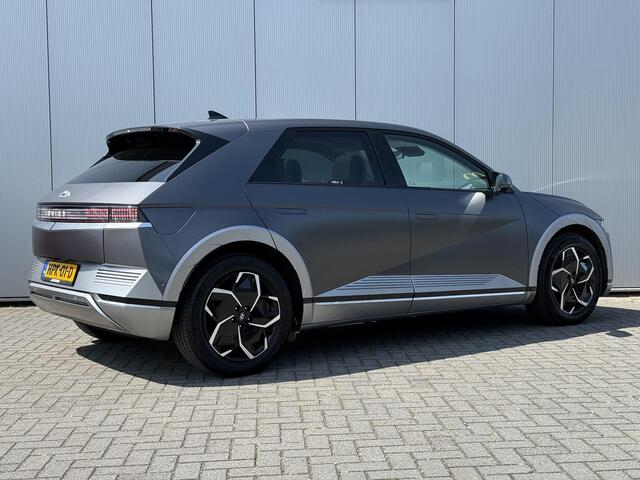 Hyundai IONIQ 5 Lounge 77.4 kWh Automaat / SOH 100% / Vision Glazen Dak / Stoelverkoeling / Stoelverwarming Voor + Achter / Elek Bedienbare Stoelen Voor + Achter / Wit Leder / 360 Camera /