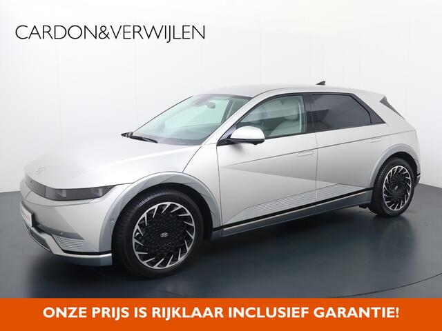 Hyundai IONIQ 5 Lounge 77.4 kWh | SoH 100% | Automaat | Multifunctioneel stuurwiel | Autohold | Automatische verlichting | Automatische achterklep | Inklapbare spiegels | Spraakbediening | Bluetooth | Stoelverwarming/Stoelventilatie | Climate | Navigatie | Apple Carpla