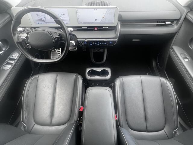 Hyundai IONIQ 5 Lounge 73kWh / Dealer onderhouden / Panoramadak / WLTP 451 km / Warmtepomp / CCS snelladen / Elektr. stoelen en klep / Stoelventilatie en verwarming / HUD / Camera 360° /