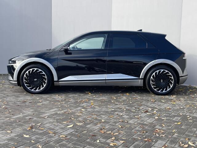 Hyundai IONIQ 5 Lounge AWD 77.4 kWh / Origineel NL Auto / Panoramadak / Camera buitenspiegels / DAB / Bose audio / HUD / Navigatie / Stuur-, voorstoel- en achterbank verwarming / Stoelventilatie