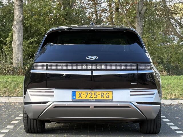 Hyundai IONIQ 5 Lounge AWD 77.4 kWh | Panoramadak | Lederen bekleding & memory functie | Warmtepomp & V2L | Geïntegreerde navigatie | Apple Carplay & Android Auto | Adaptieve Cruisecontrol | Camera | Warmtepomp | Stoel & stuur verwarming | Premium audio BOSE |