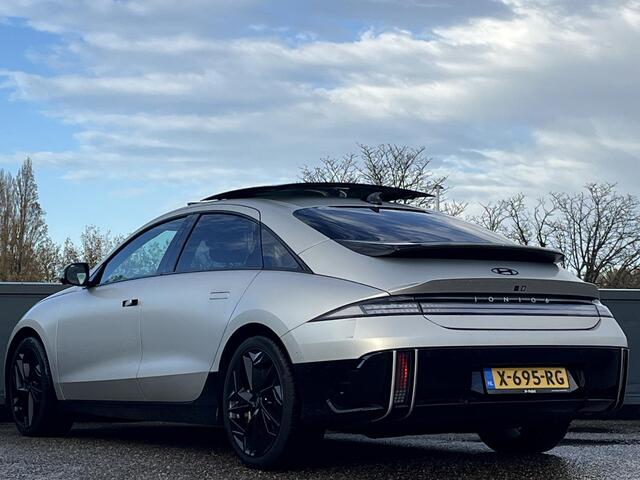 Hyundai IONIQ 6 First Edition AWD 77.4 kWh 325PK | Panorama schuifkanteldak | 800 V snellaadsysteem 10-80% in ca. 18 minuten | 20? lichtmetalen velgen & matzwarte designaccenten | BOSE premium audiosysteem | Premium interieur |