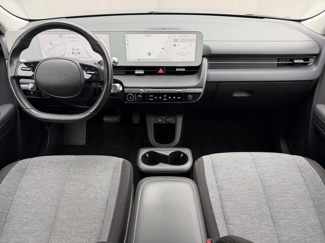 Hyundai IONIQ 5 Connect 77.4 kWh Automaat / Afneembare Trekhaak 1600kg trekgewicht / Dealer onderhouden / Fabrieksgarantie tot 12-2027 / 8 Jaar Batterij Garantie / Warmtepomp / Camera / Navigatie / Stoel & Stuurwiel Verwarming / Adaptieve Cruise / Apple Carplay & Andro