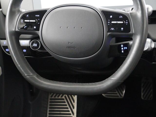 Hyundai IONIQ 5 Connect 58 kWh | SOH 91% | Warmtepomp | Stoelverwarming | Adaptive cruise | Bose Sound | Camera | Carplay | Half leder | Vehicle-to-load | Keyless | Navigatie | Full LED