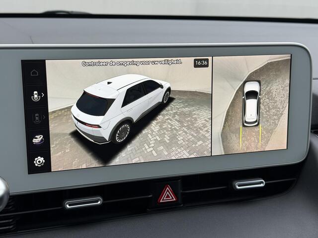 Hyundai IONIQ 5 Lounge AWD 77.4 kWh 325Pk Automaat / SOH 98% / Afn. Trekhaak / Dealer onderhouden / Fabrieksgarantie tot 11-2027 / 8 Jaar Batterij Garantie / Warmtepomp / HUD / 360 Camera / BOSE / Navigatie / Adaptieve Cruise / Elektr. Stoelen / Elektr. Achterklep / St