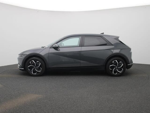 Hyundai IONIQ 5 77.4kWh Core | Elektr. bed. achterklep | Climate Control / ECC | Licht metalen velgen 19 inch | Cruise control Adaptive | Navigatie | Stoelverwarming | LED koplampen | Park Distance Control voor en achter | Achteruitrijcamera | Electrisch verstelbare be