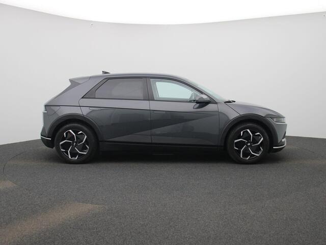 Hyundai IONIQ 5 77.4kWh Core | Elektr. bed. achterklep | Climate Control / ECC | Licht metalen velgen 19 inch | Cruise control Adaptive | Navigatie | Stoelverwarming | LED koplampen | Park Distance Control voor en achter | Achteruitrijcamera | Electrisch verstelbare be