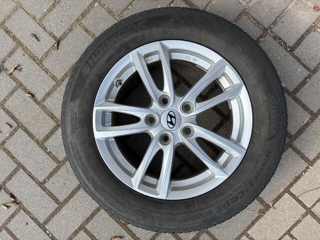 Hyundai IONIQ Premium EV 38 kWh Automaat / SOH 98,1% / Dealer onderhouden / Warmtepomp / Lederen bekleding / Stuur-/Stoel-/Achterbankverwarming / Stoelventilatie / Adaptieve Cruise Control / Achteruitrijcamera /