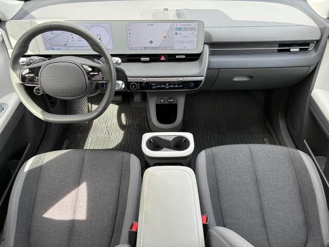 Hyundai IONIQ 5 Style 77.4 kWh / SOH 100% / Fabrieksgarantie t/m 12-2027 / Dealer onderhouden / Weinig km / Warmtepomp / CCS snel laden / Adaptieve Cruise Control / Navigatie / Apple Carplay Android / 19" LM wielen /