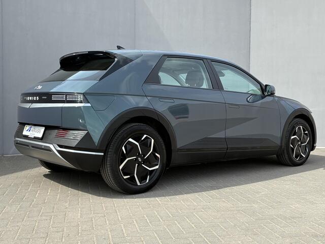 Hyundai IONIQ 5 Style 77.4 kWh / SOH 100% / Fabrieksgarantie t/m 12-2027 / Dealer onderhouden / Weinig km / Warmtepomp / CCS snel laden / Adaptieve Cruise Control / Navigatie / Apple Carplay Android / 19" LM wielen /