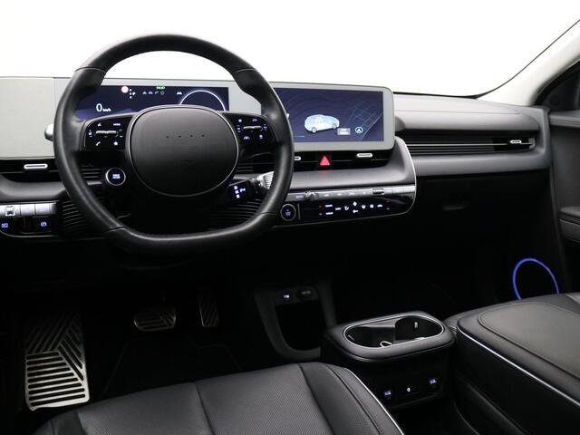 Hyundai IONIQ 5 Connect+ 77.4 kWh / HUD Display / SoH 100% / Lederen bekleding / 1ste Eigenaar / NL Auto / Elektrische voorstoel / 3 fase / Warmtepomp / Adaptieve Cruise Control / Dealer onderhouden / All Seasonbanden /