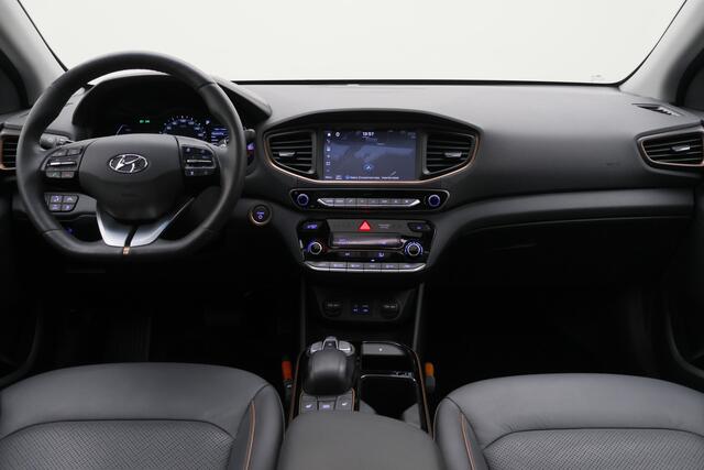 Hyundai IONIQ Premium EV SOH 99%, Leer, Schuif-/Kanteldak, Camera, Apple Carplay, ACC, Trekhaak, PDC
