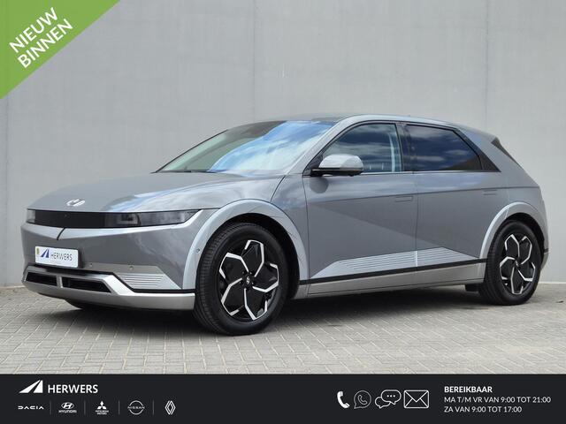 Hyundai IONIQ 5 Lounge 77.4 kWh / SOH 99% / Dealer onderhouden / Fabrieksgarantie tot 04-2028 / Trekhaak afneembaar / CCS snelladen / Rondomzicht camera / Trekgewicht 1600 kg / Stuur- Stoel & Achterbank verwarming / Adaptief cruise control / Stoelventilatie / Elektrisc