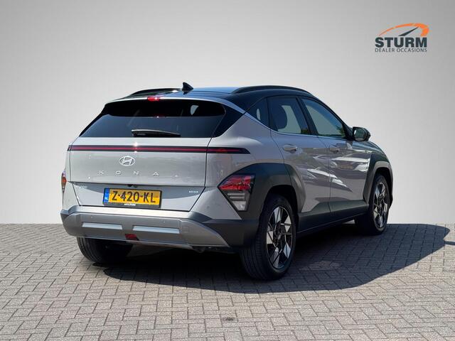 Hyundai Kona 1.6 GDI HEV Premium | Two-Tone Lakkleur | Stoelverwarming + -Ventilatie | 360° Camera | Leder | Navigatie | Apple Carplay/Android Auto | Geheugenstoel | Rijklaarprijs!