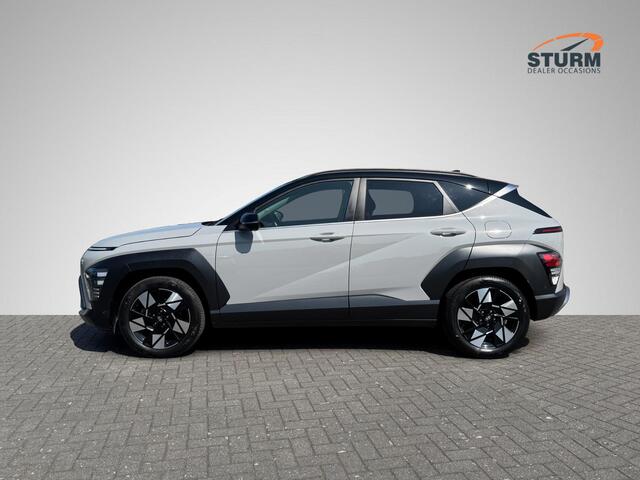 Hyundai Kona 1.6 GDI HEV Premium | Two-Tone Lakkleur | Stoelverwarming + -Ventilatie | 360° Camera | Leder | Navigatie | Apple Carplay/Android Auto | Geheugenstoel | Rijklaarprijs!