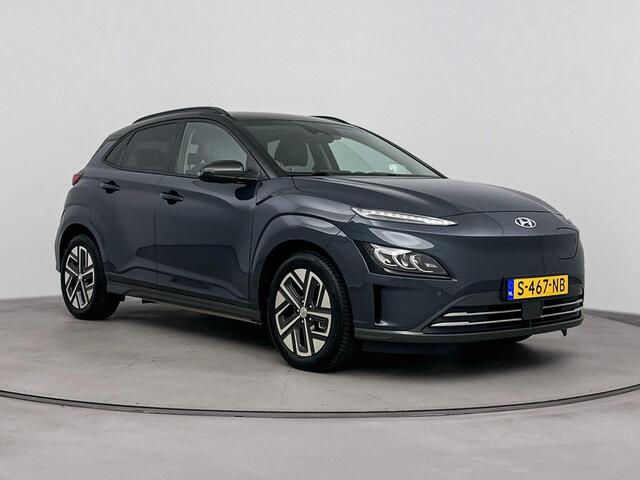 Hyundai Kona EV Premium 64 kWh | Trekhaak afneembaar | Climate control | Camera | Cruise control | Navi | Electrische stoelverstelling |