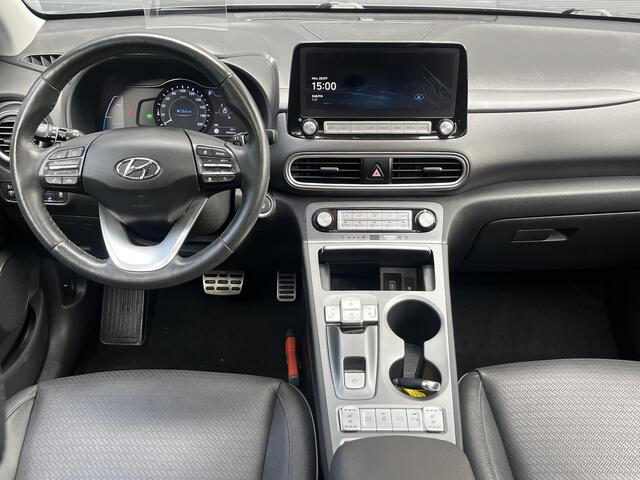 Hyundai Kona EV Premium 64 kWh / Lederen bekleding / 100 % SOH / Trekhaak / Climate control / Adaptieve cruise control / Stoel-stuur verwarming / Elektrisch schuifkantel dak /