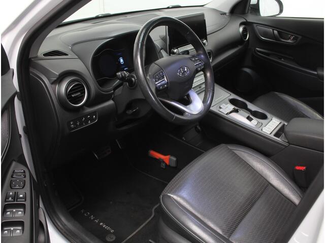 Hyundai Kona EV Premium 64 kWh CARPLAY | 3 FASE | CAMERA | DAB | LED | STOELVERW/VENT | LMV | ADAPCRUISE | LEER | HEAD-UP