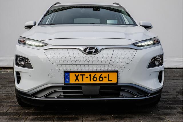 Hyundai Kona EV Premium 64 kWh Schuifdak/ Stoel-stuurverwarming/ Krell audio/ Camera/ Head up/ Blindspot/ Carplay