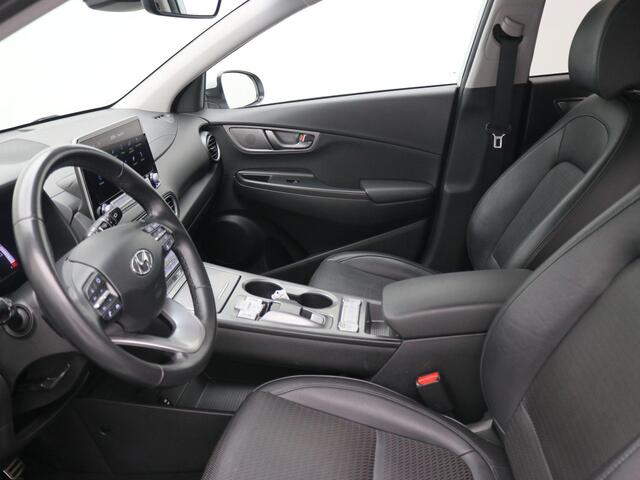 Hyundai Kona EV Fashion 64 kWh / SOH 100% / Lederen Bekleding / Navigatie / KRELL Audio / Adaptive Cruise Control / Climate Control / Achteruitrijcamera /