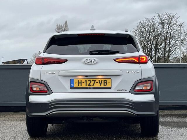 Hyundai Kona EV Premium 64 kWh | 3-Fase OBC | Schuifkanteldak | Lederen bekleding | Long Range Accu | Volledig dealer onderhouden | Allseason banden |