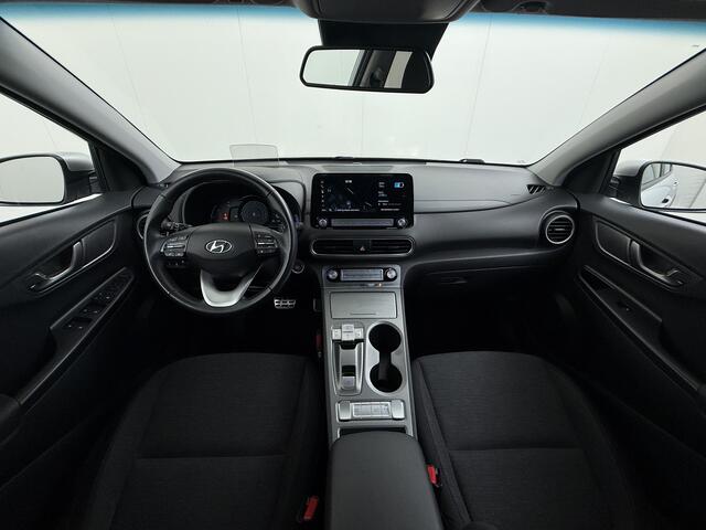 Hyundai Kona EV 64kWh SOH-100% Warmtepomp Adaptive-Cruise Head-Up Display 1/2 Leer Krell®-Hifi Apple Carplay Android Adap.Cruise Camera Navi Pdc Ecc Fashion Keyless Privacy Glas DAB Led Blind Spot Lane Assist Origineel Nederlandse Auto
