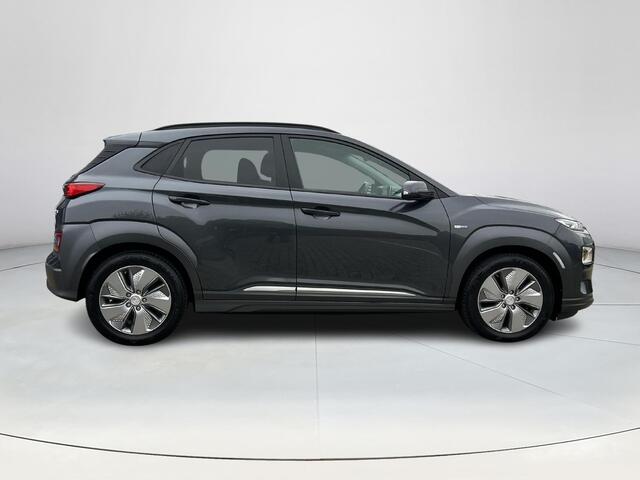 Hyundai Kona EV Fashion 64 kWh | Climate control | Achteruitrijcamera | Applecarplay Android auto | Krell premium audio | Dodehoeksensoren | Adaptieve Cruise control |