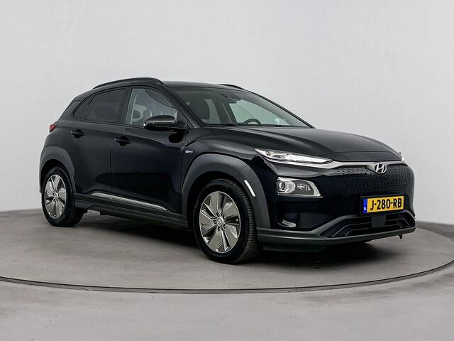 Hyundai Kona EV Premium 64 kWh | Soh 96,2% | Achterruitrij Camera | Dodehoek Detectie | Stoel verwarming & ventilatie | DAB Radio |
