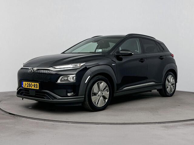 Hyundai Kona EV Premium 64 kWh | Soh 96,2% | Achterruitrij Camera | Dodehoek Detectie | Stoel verwarming & ventilatie | DAB Radio |