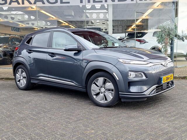 Hyundai Kona EV Premium 64 kWh | SOH: 94,6% | Leder | Warmtepomp | Adaptive CC | Navi | Camera |