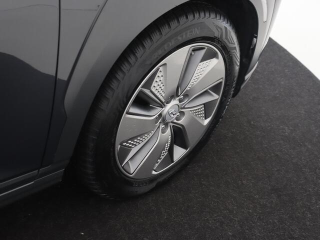 Hyundai Kona EV Premium 64 kWh | Navigatie | Elektrisch schuifdak | Stoelverwarming | Climate control | Camera |