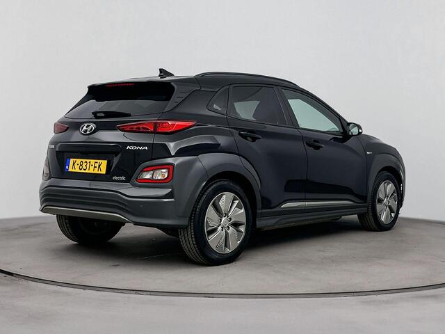 Hyundai Kona EV Fashion 64 kWh | Navigatie| SOH 95.7% | Achteruitrij Camera | Dodehoek Detectie | Head Up Display |