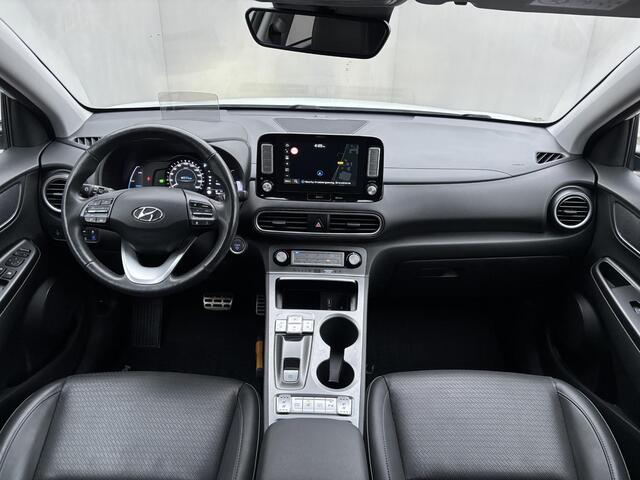 Hyundai Kona EV Premium 64 kWh / Volledig Dealer Onderhouden / 8 jaar batterijgarantie tot 160.000km / SOH 100% / 3-Fase / Adaptieve cruise control / HUD / Lederen bekleding / Stoelverwarming, Stoelventilatie & Stuurverwarming / Apple carplay/Android auto /