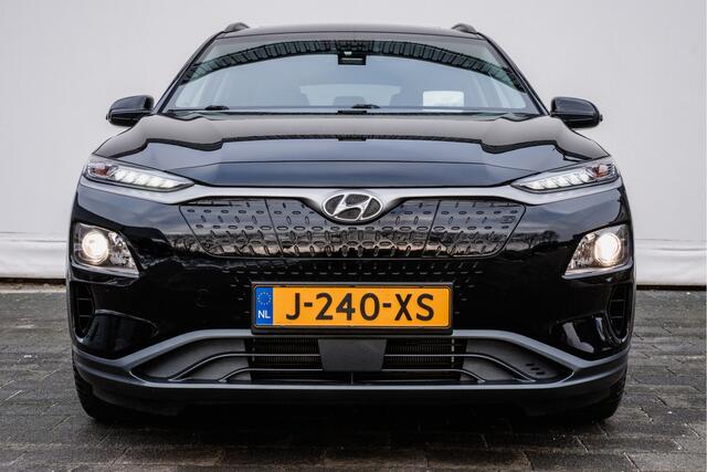 Hyundai Kona EV Fashion 64 kWh Trekhaak/ Schuif-kanteldak/ Stoelverwarming/ Half lederen int./ HUD/ Blindspot