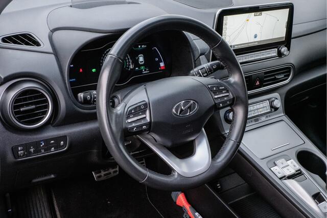 Hyundai Kona EV Fashion 64 kWh Trekhaak/ Schuif-kanteldak/ Stoelverwarming/ Half lederen int./ HUD/ Blindspot