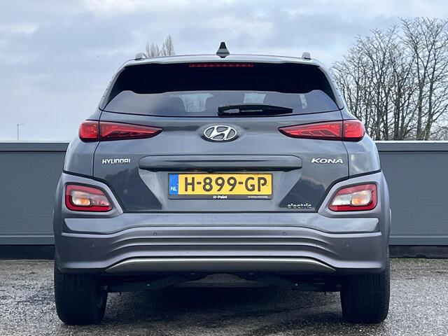 Hyundai Kona EV Premium 64 kWh | SCHUIFKANTELDAK | LEDEREN BEKLEDING | HEAD UP DISPLAY | ADAPTIEVE CRUISECONTROL | GEÏNTEGREERDE NAVIGATIESYSTEEM | MULTIMEDIA APPLE CARPLAY & ANDROID AUTO |