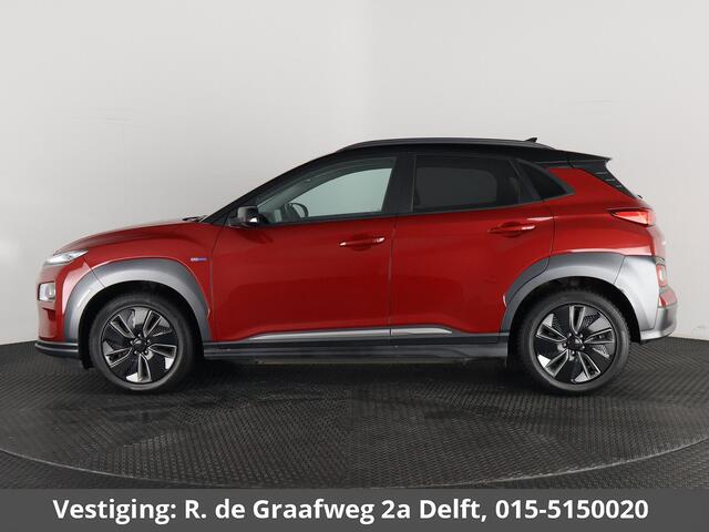 Hyundai Kona EV Premium Two-Tone 64 kWh SOH ACCU 99% | Apple Carplay/Android Auto | Stuur-& Stoelverwarming | Navigatie | Leder | Camera |