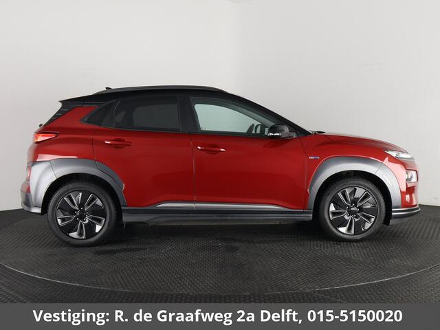 Hyundai Kona EV Premium Two-Tone 64 kWh SOH ACCU 99% | Apple Carplay/Android Auto | Stuur-& Stoelverwarming | Navigatie | Leder | Camera |