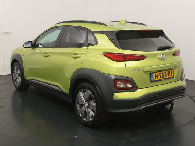 Hyundai Kona EV Premium 64 kWh | Trekhaak | Voorstoelen vewarmd&verkoeld | Warmtepomp | Adapt. Cruise | HUD | Leder |