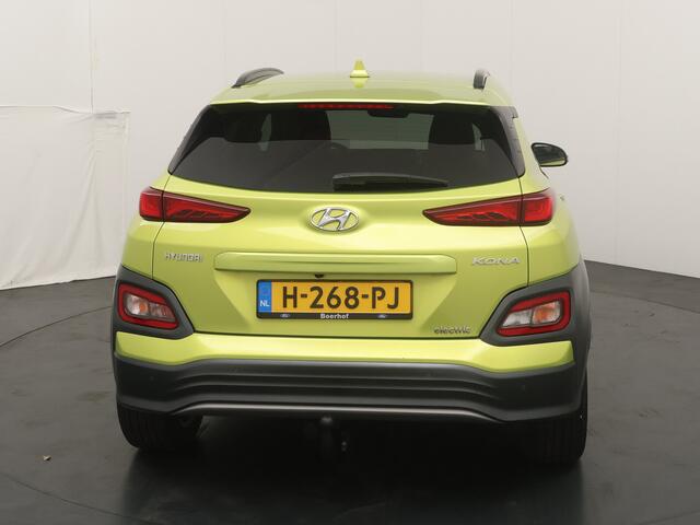 Hyundai Kona EV Premium 64 kWh | Trekhaak | Voorstoelen vewarmd&verkoeld | Warmtepomp | Adapt. Cruise | HUD | Leder |
